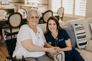 client and caregiver smiling